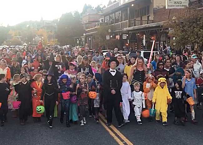 people in costumes marching in the Wernersville Halloween Parade